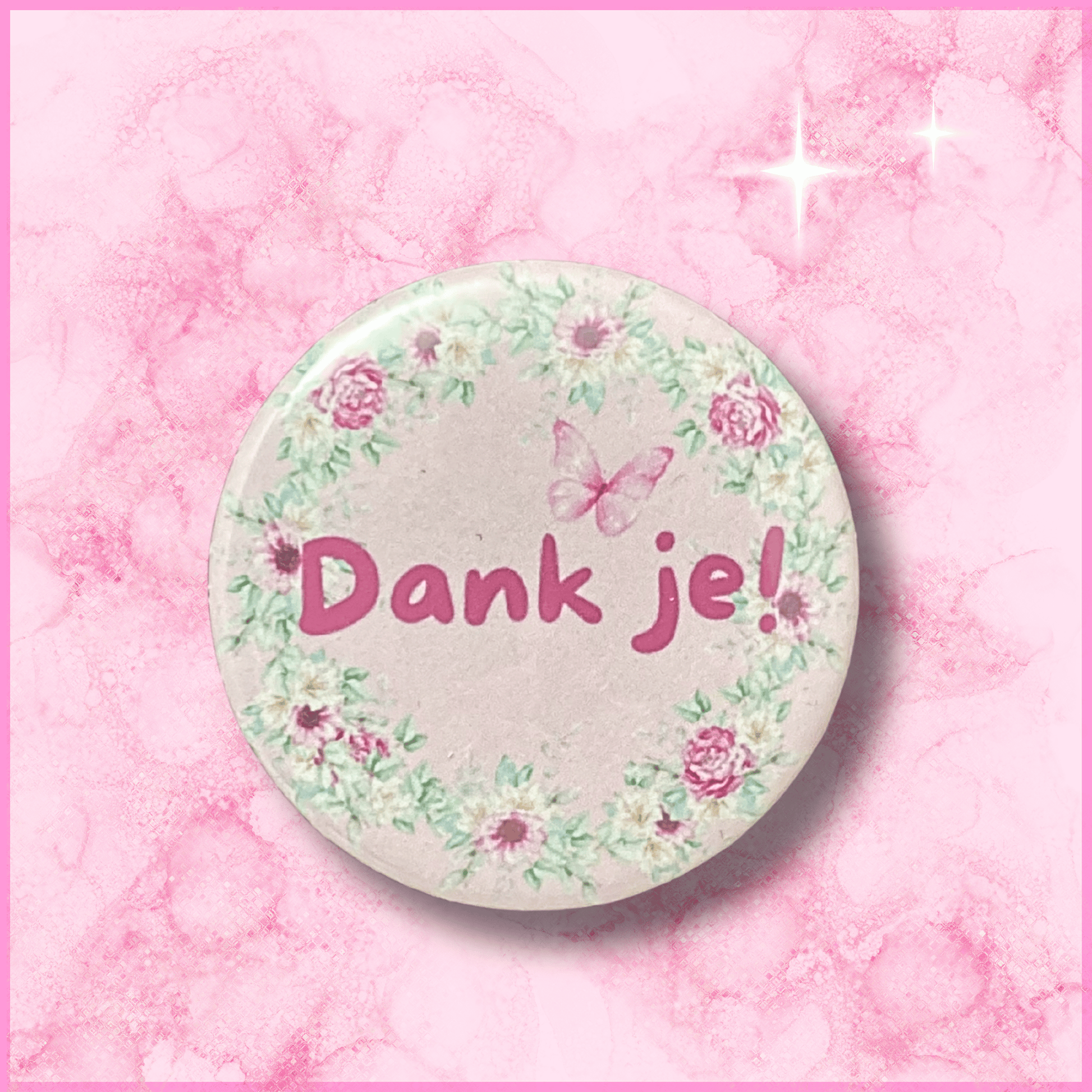 Voorkant van een ronde fotomagneet (38mm) met een bedankje erop (Dank je!)