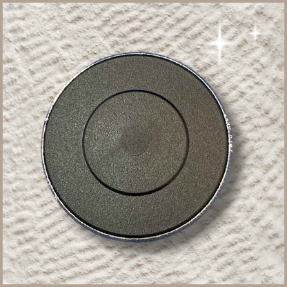 Achterkant van een ronde gepersonaliseerde fotomagneet van 38 mm.